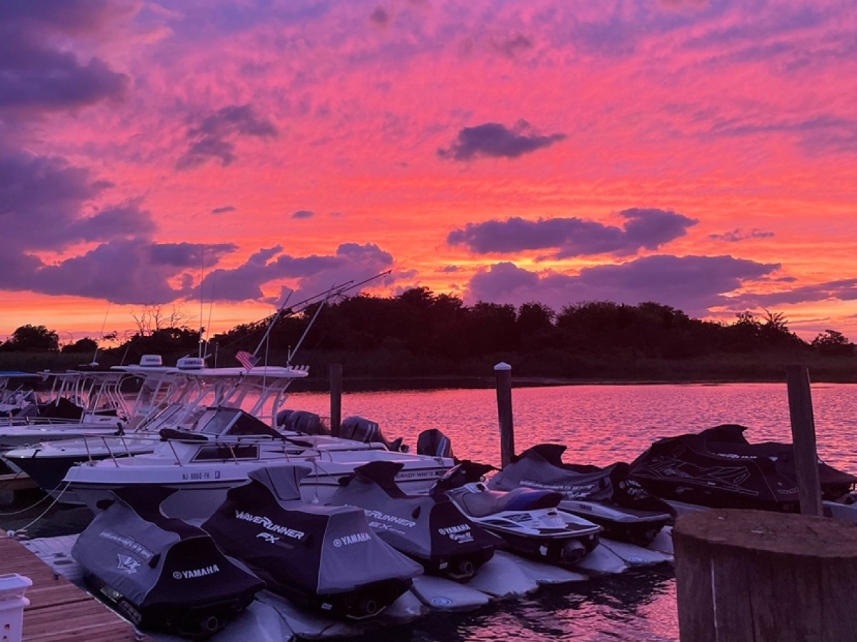 a sunset over a body of water